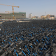 Bluegogo rental bikes in a parking lot in Beijing.